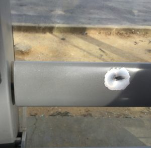 Bullethole from Smith's homicide at the bus stop in SE